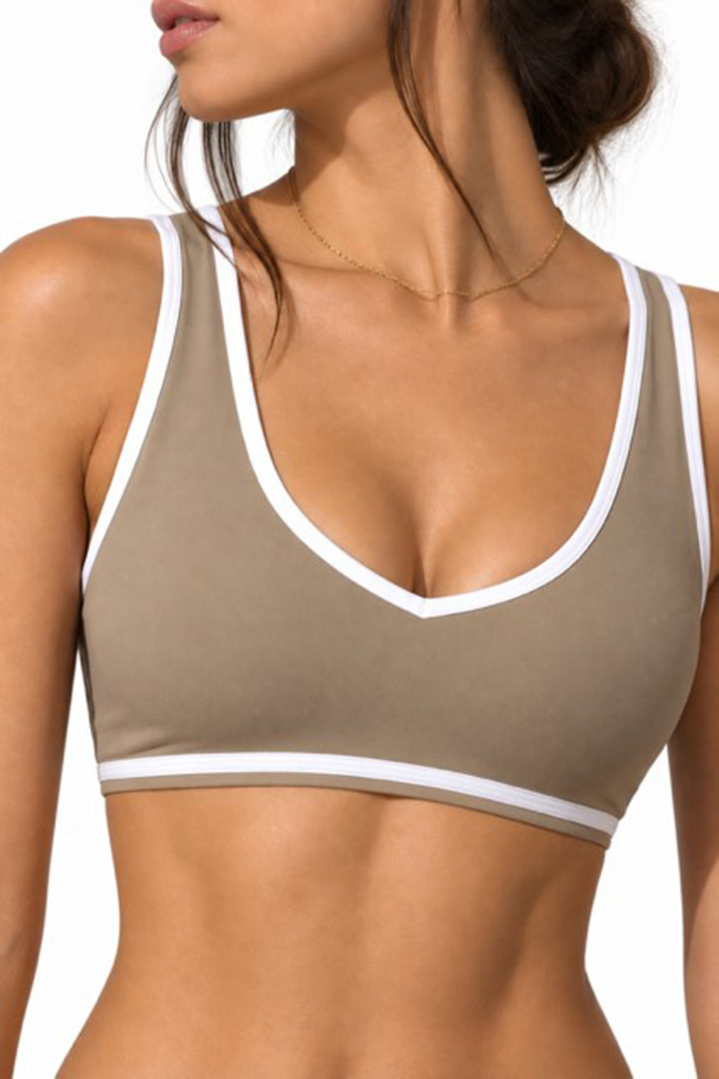 Sand sports bra with white trim, front close-up